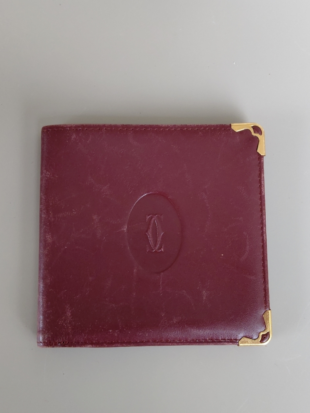 Cartier Burgundy Leather Compact with Gold Corners
